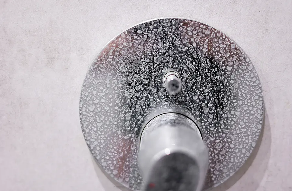 Detailed view of a gas appliance control valve in a kitchen